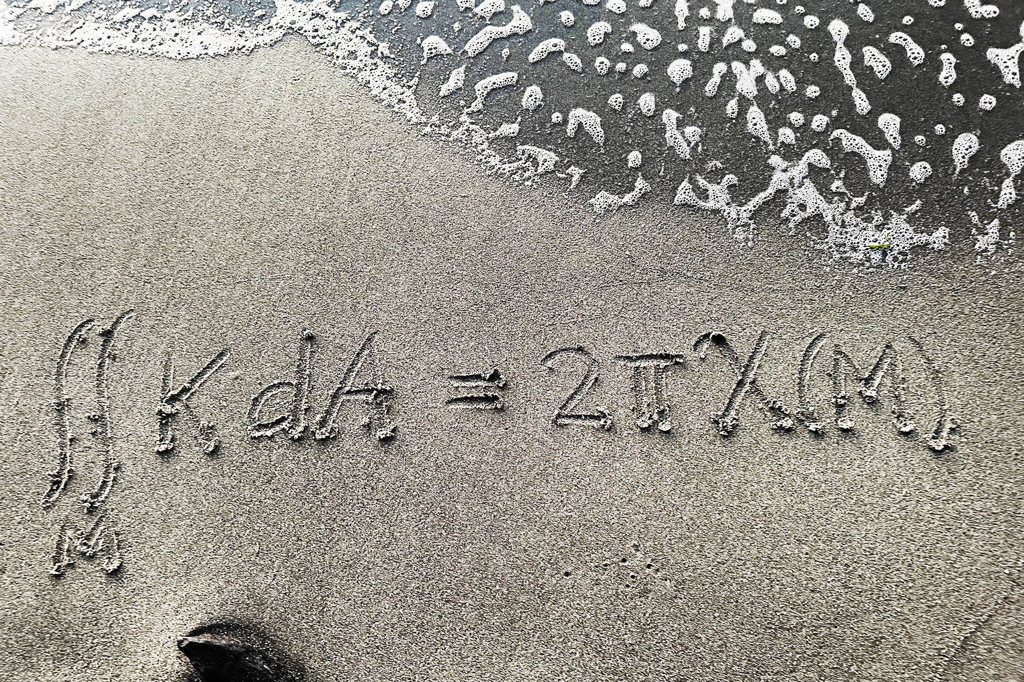 These Are the Most Beautiful Equations in Mathematics 1 Math equation written in sand.